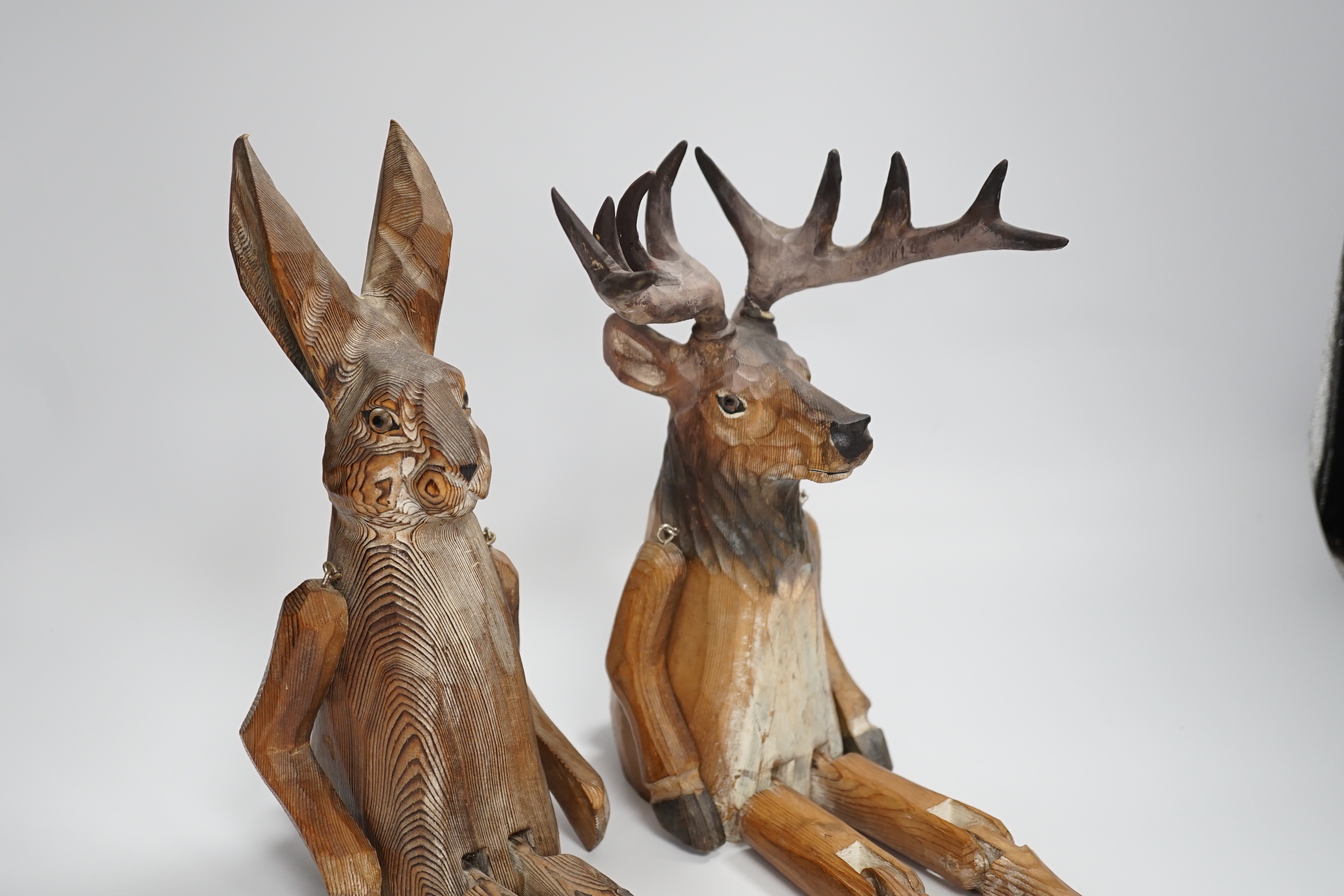 A of novelty jointed carved wooden Deer and similar Hare - 43cm